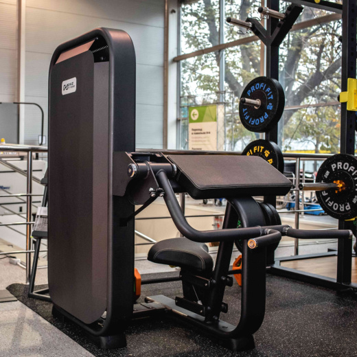 Бицепс-машина сидя. Стек 95 кг. DHZ E-7030